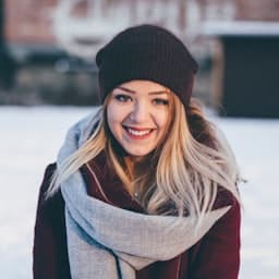 Woman with brown hair in casual setting